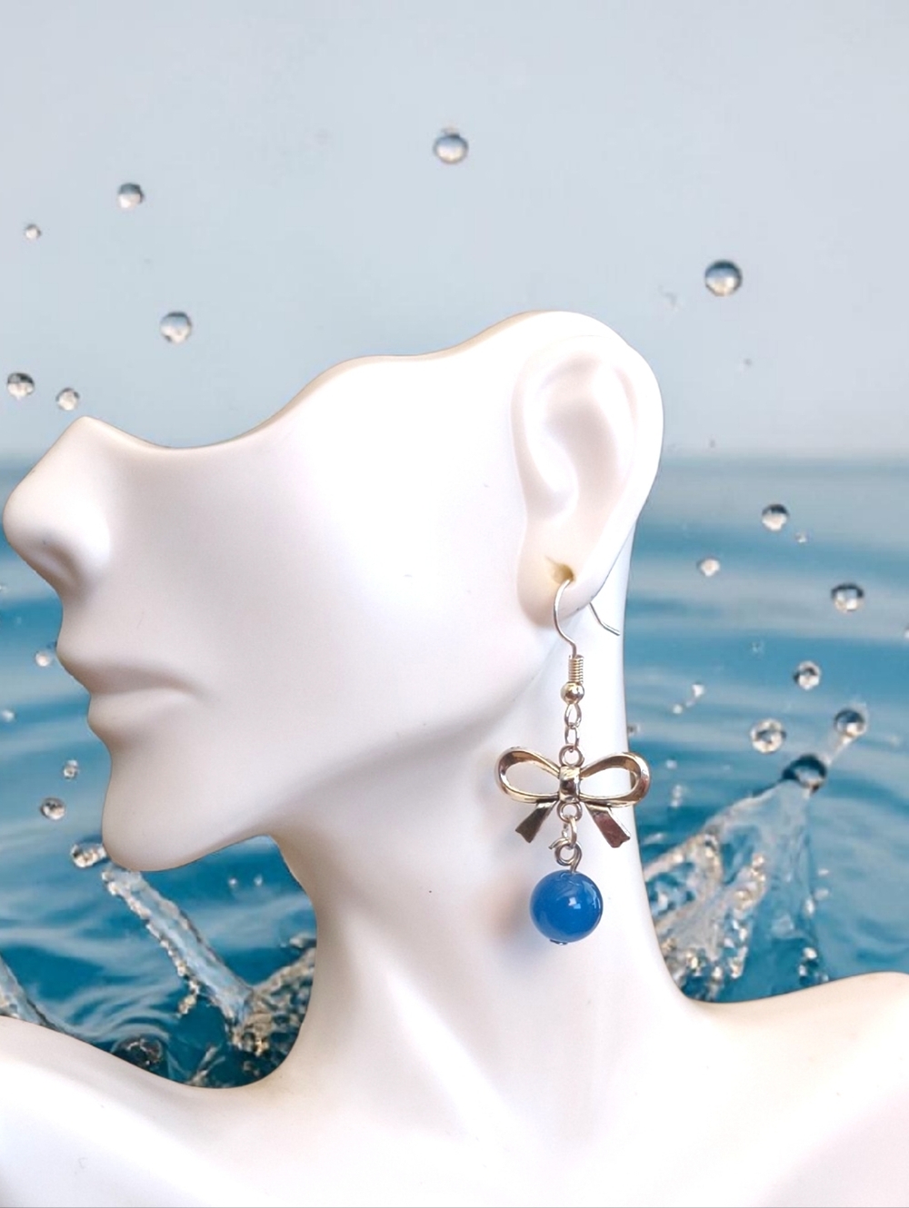 Silver Bow Dangle Earrings with Blue Bead